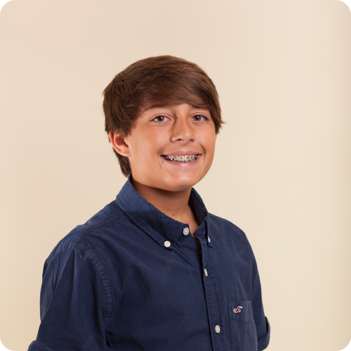 Smiling teen with braces at Sheffield Orthodontics in Brentwood, CA